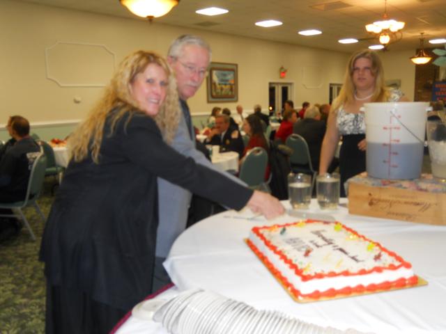 President Jim Smith and Rescue Chief cut the cake!